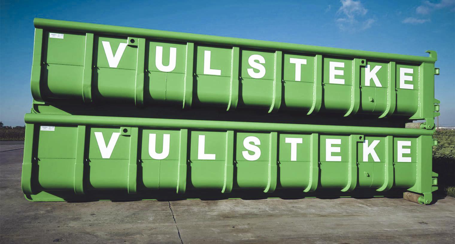Twee groene, gestapelde Vulsteke containers